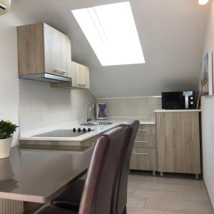 Kuchyňa alebo kuchynka v ubytovaní Apartments Villa Učka