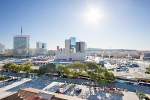 a view of a city skyline with buildings at SANTS STATION PENTHOUSE in Barcelona