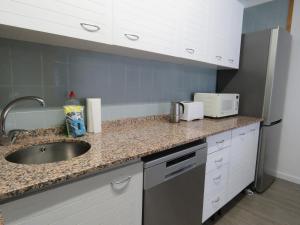 Kuchyň nebo kuchyňský kout v ubytování SUITEDREAMS - Av. Fener