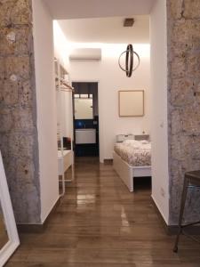 Ένα ή περισσότερα κρεβάτια σε δωμάτιο στο ViVi House