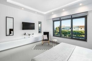 A television and/or entertainment centre at Villa Summer Light
