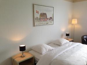 Postel nebo postele na pokoji v ubytování Hotel Vadehavet
