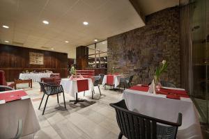 Reštaurácia alebo iné gastronomické zariadenie v ubytovaní Retro Hotel Kladno