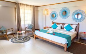 Postel nebo postele na pokoji v ubytování Hotel L'Archipel