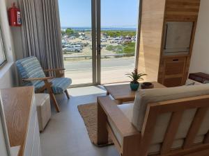 En sittgrupp på Oceans Guest House & Luxurious Apartments