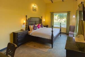 Tuli Veer Bagh Resort客房内的一张或多张床位