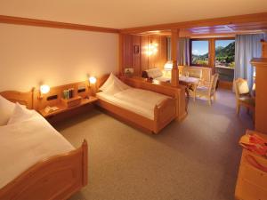 Posteľ alebo postele v izbe v ubytovaní Hotel Omesberg