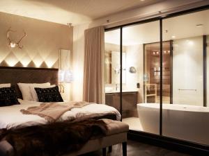 Postel nebo postele na pokoji v ubytování Lapland Hotels Bulevardi