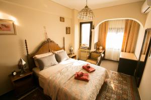 Ένα ή περισσότερα κρεβάτια σε δωμάτιο στο Spacious Apartment Next To Metro - Marousi