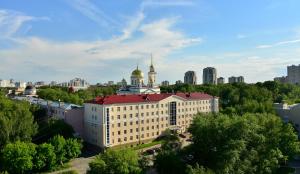 an aerial view of a large building in a city at Green Park Hotel in Yekaterinburg