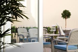 Zona de estar de 54 Queen's Gate Hotel