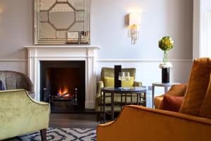 Zona de estar de 54 Queen's Gate Hotel