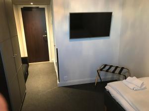 Postel nebo postele na pokoji v ubytování Hotell Gamla Staden
