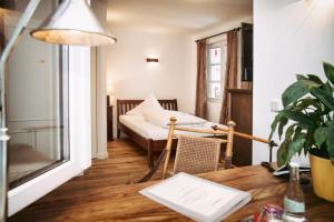 Posezení v ubytování Landhaus Hotel Wolfratshausen