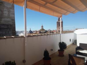 a view from the balcony of a building at APARTAMENTO PUERTA SEVILLA in Carmona