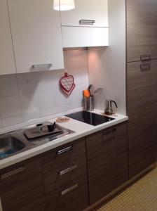 a kitchen with a sink and a counter top at Chloé in Levanto