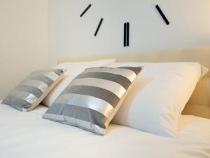 Posteľ alebo postele v izbe v ubytovaní Apartment Platinium I