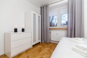 Posteľ alebo postele v izbe v ubytovaní Apartment Platinium I