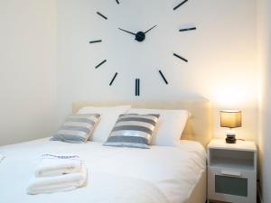 Posteľ alebo postele v izbe v ubytovaní Apartment Platinium I