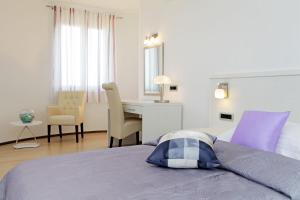 Posteľ alebo postele v izbe v ubytovaní Villa Nera