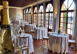 Reštaurácia alebo iné gastronomické zariadenie v ubytovaní Relaisfranciacorta