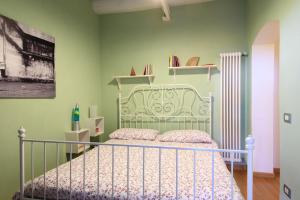 Posteľ alebo postele v izbe v ubytovaní In Arezzo Apartment