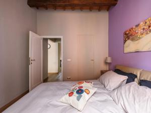 Posteľ alebo postele v izbe v ubytovaní In Arezzo Apartment