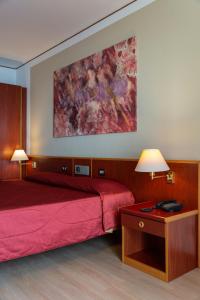 Postel nebo postele na pokoji v ubytování Hotel Torre Normanna