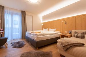 Letto o letti in una camera di Haus Melitta