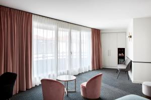 Posezení v ubytování Best Western Hotel du Pont Wilson