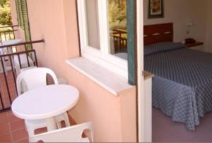 Postel nebo postele na pokoji v ubytování Albergo Belvedere