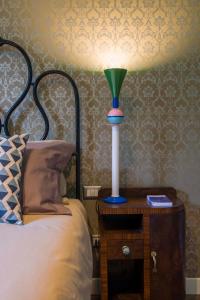 Posteľ alebo postele v izbe v ubytovaní Frími Boutique Rooms b&b