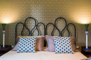 Posteľ alebo postele v izbe v ubytovaní Frími Boutique Rooms b&b