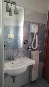 Ett badrum på Hotel Esperia