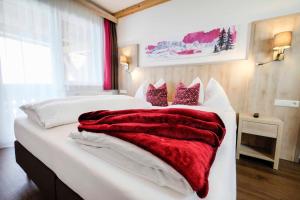 Posteľ alebo postele v izbe v ubytovaní Aktiv Hotel Karnia