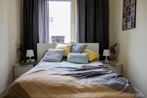Posteľ alebo postele v izbe v ubytovaní Apartamenty KDN na Rysiej