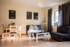 Posedenie v ubytovaní Apartamenty KDN na Rysiej