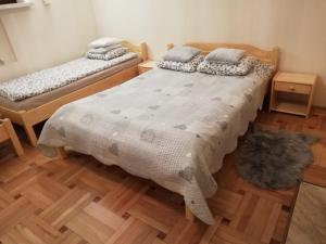 Posteľ alebo postele v izbe v ubytovaní Willa Miś