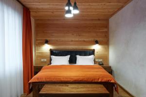 Postel nebo postele na pokoji v ubytování Ganz & SPA