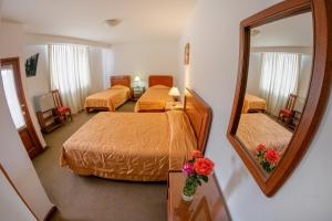 Ein Bett oder Betten in einem Zimmer der Unterkunft Hotel Incasol