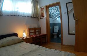 Posteľ alebo postele v izbe v ubytovaní Plitvice Pension Perisic
