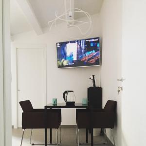 Televisyen dan/atau pusat hiburan di Paolino Exclusive Rooms