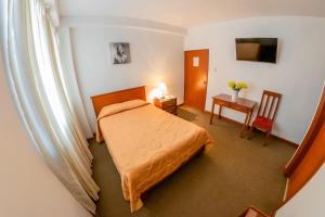 מיטה או מיטות בחדר ב-Hotel Incasol
