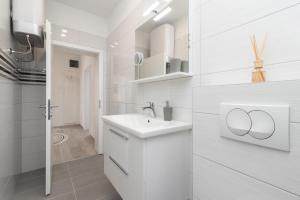 Kúpeľňa v ubytovaní Apartments Peca + 10 fotografií