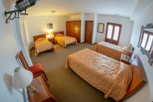 מיטה או מיטות בחדר ב-Hotel Incasol
