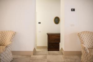 Posezení v ubytování Masseria Fontana di Vite