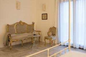 Posezení v ubytování Masseria Fontana di Vite