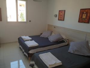 Een bed of bedden in een kamer bij Casa di a Murza