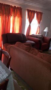 Posezení v ubytování Sue's Homestay