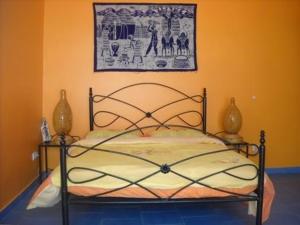 Ένα ή περισσότερα κρεβάτια σε δωμάτιο στο EDEN BEACH SAINT-LOUIS